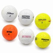 Six assorted practice golf balls, including Titleist, Kirkland, Nitro and Bridgestone