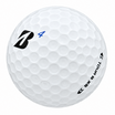 Bridgestone Tour B XS golf ball in white, showing the logo and number
