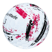TaylorMade SpeedSoft Ink golf ball in white with a red ink splatter design