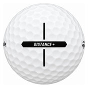 TaylorMade Distance+ golf ball in white, showing the cross-shaped alignment stamp